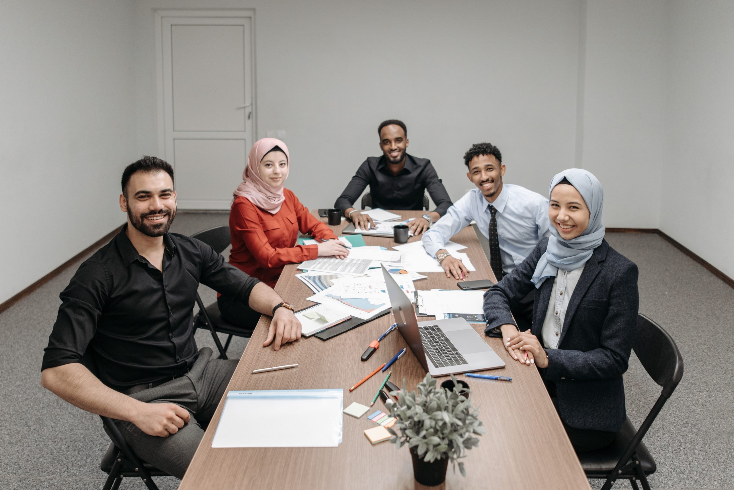 A men and women sitting at the table together