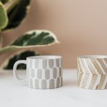 Ceramic cups on marble table