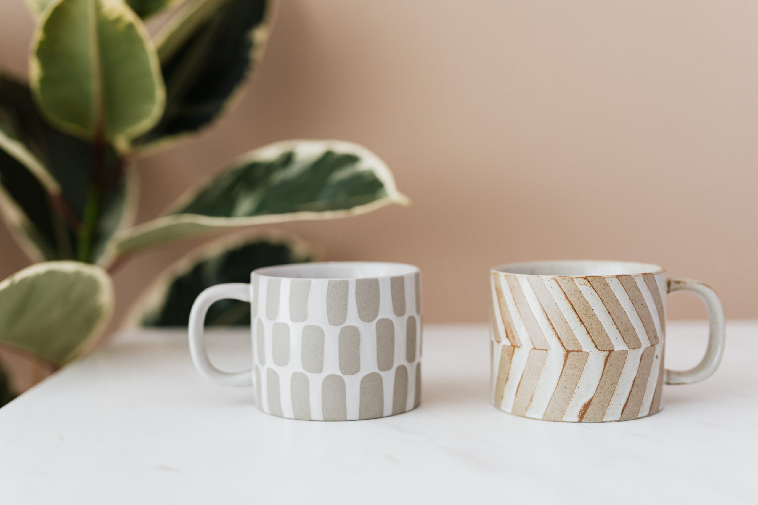 Ceramic cups on marble table